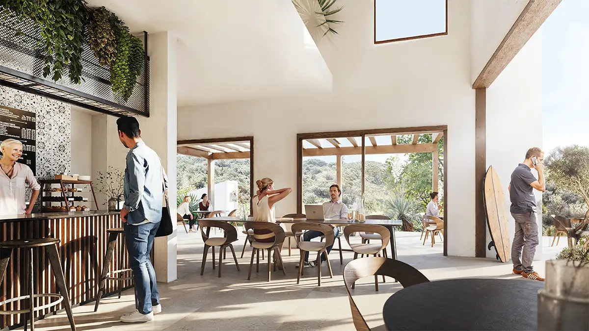 Modulares-Wohnprojekt-Portugal-Urban-Cell_Cafe Modernes Café, in dem mehrere Personen sitzen, bestellen und arbeiten, mit großen Fenstern und natürlichem Licht.